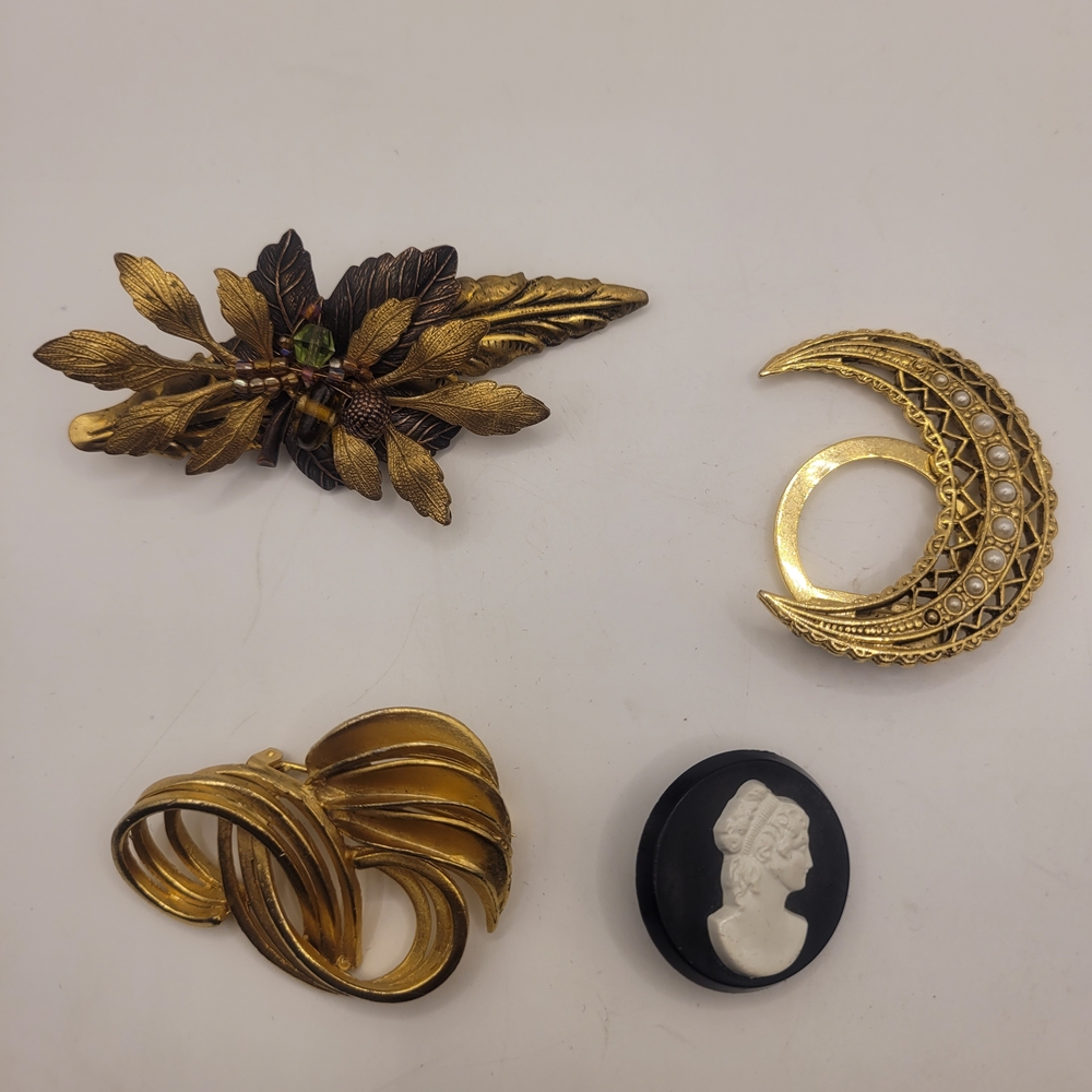 Gold and Black Vintage Brooch Set
